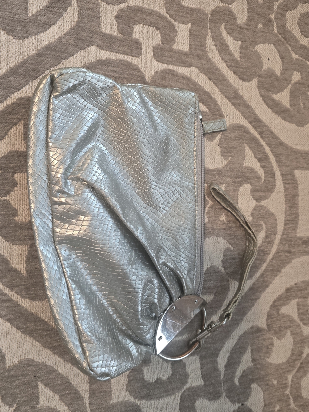 Silver Textured Wristlet Clutch with Oval Metal Accent